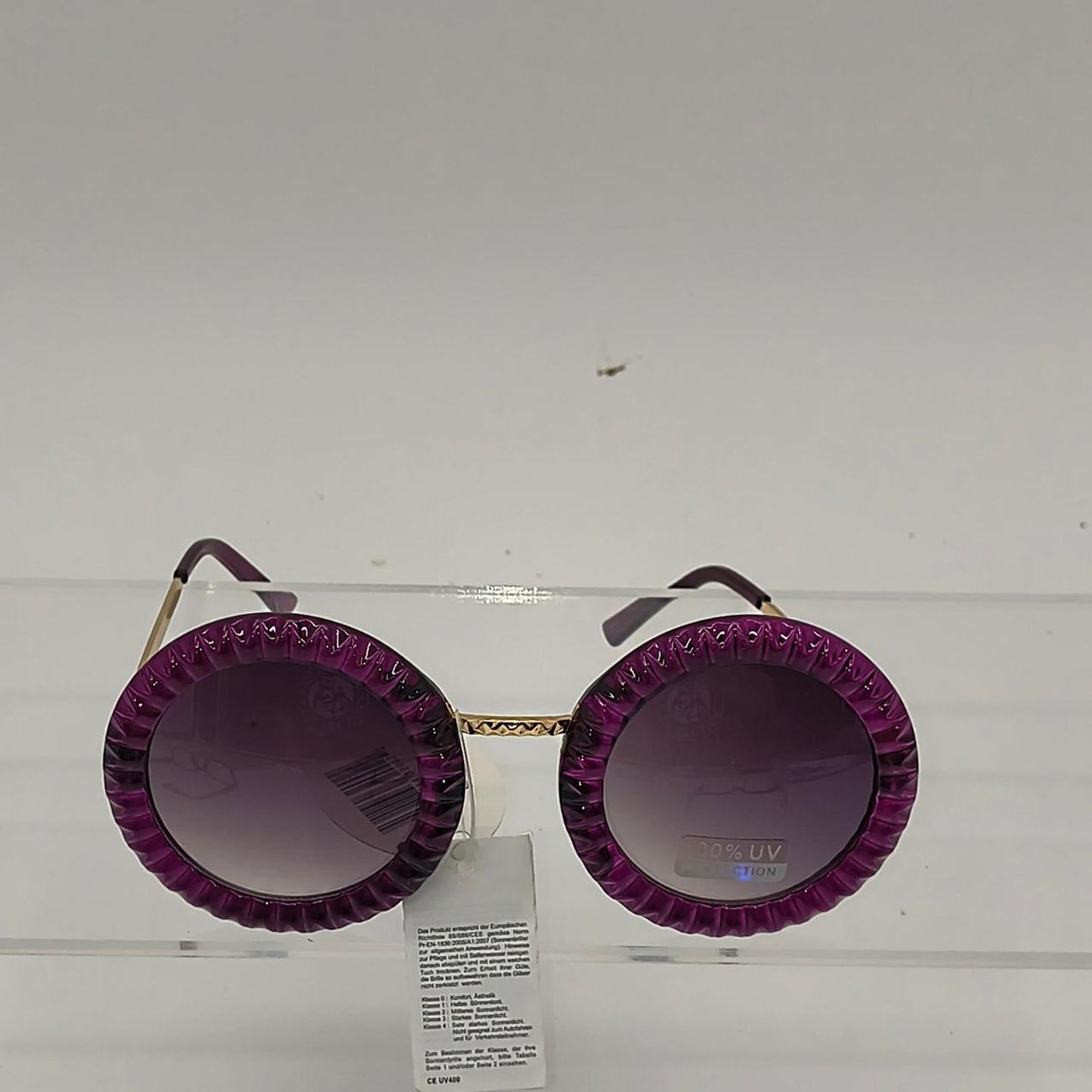 Purple round sunglasses with gold