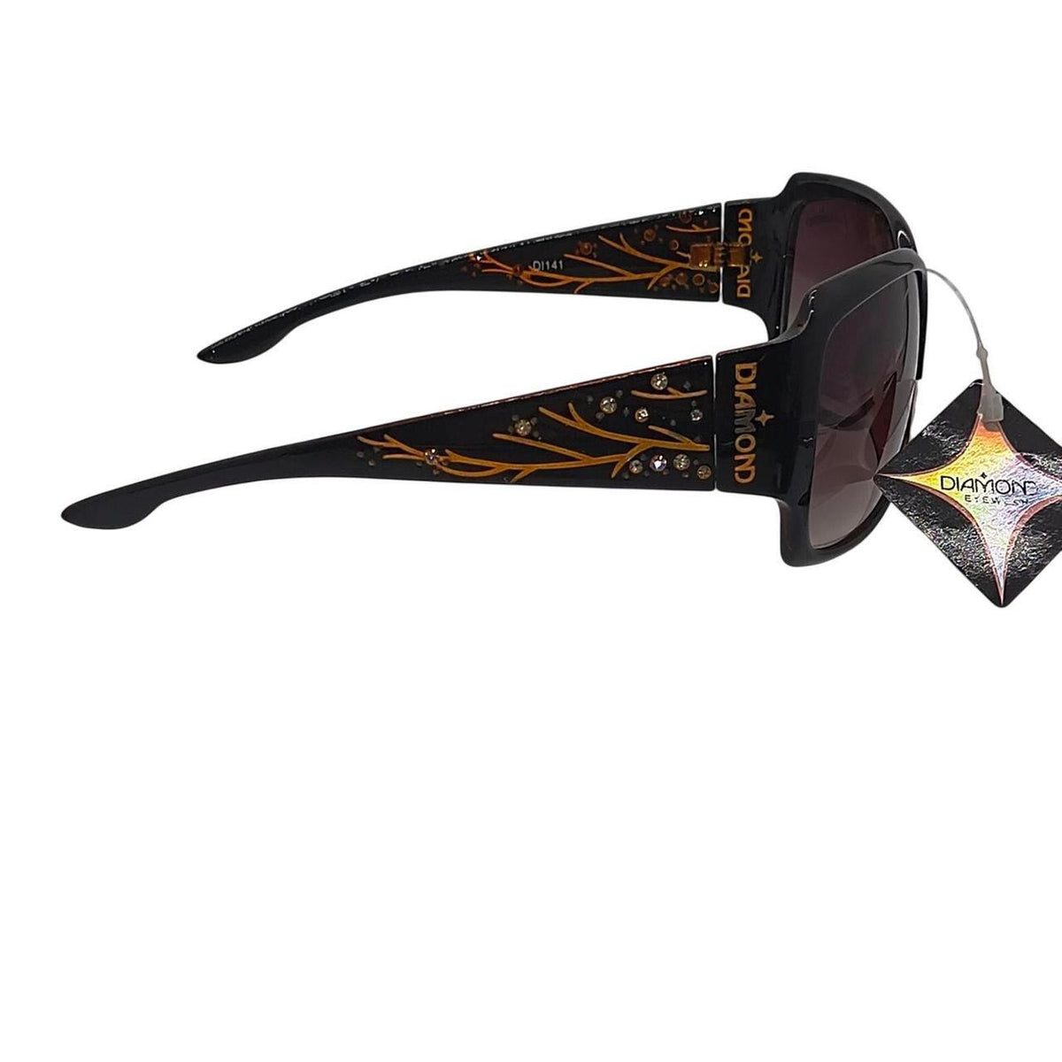 Diamond Eyewear sunglasses with gold branch-like design and rhinestones