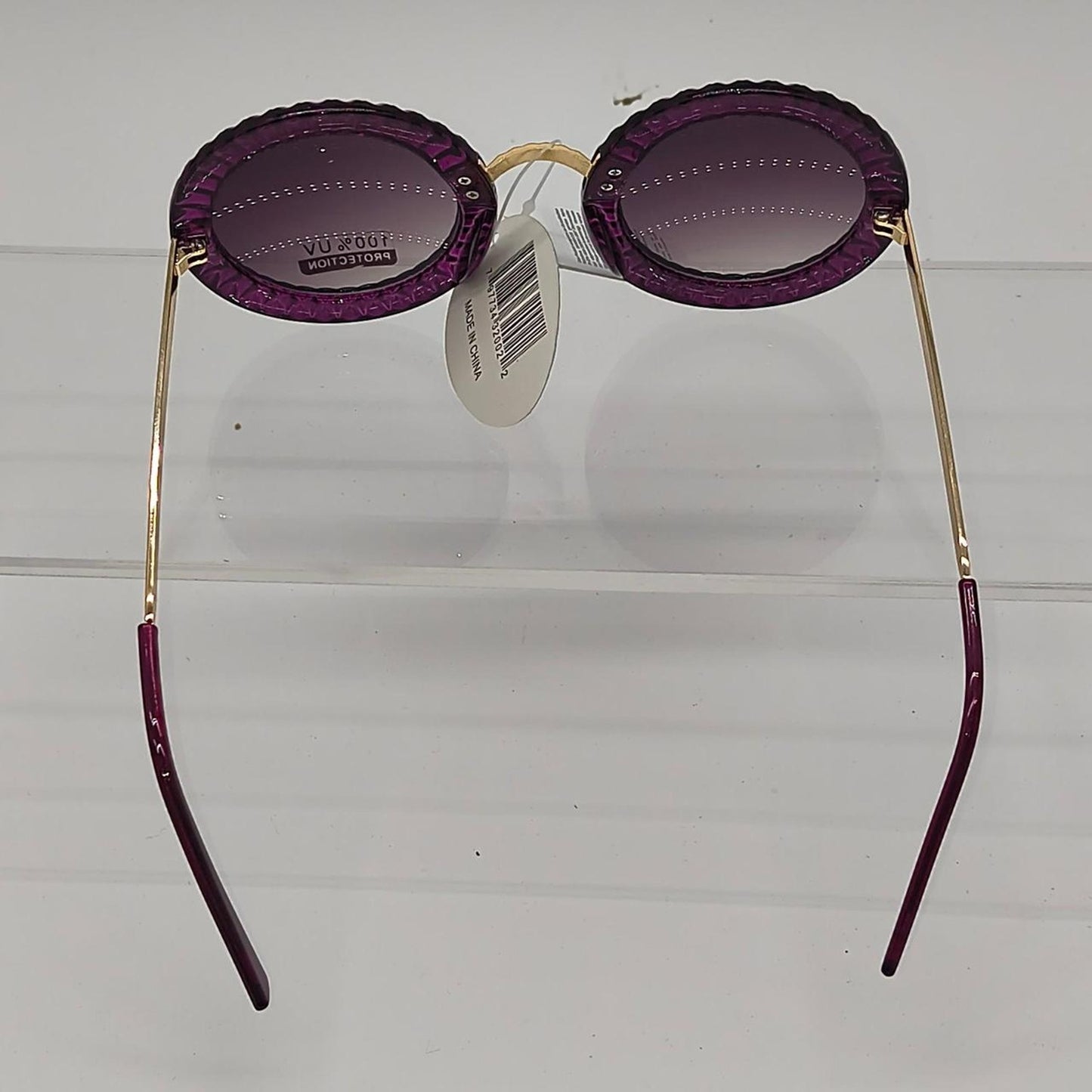 Purple round sunglasses with gold