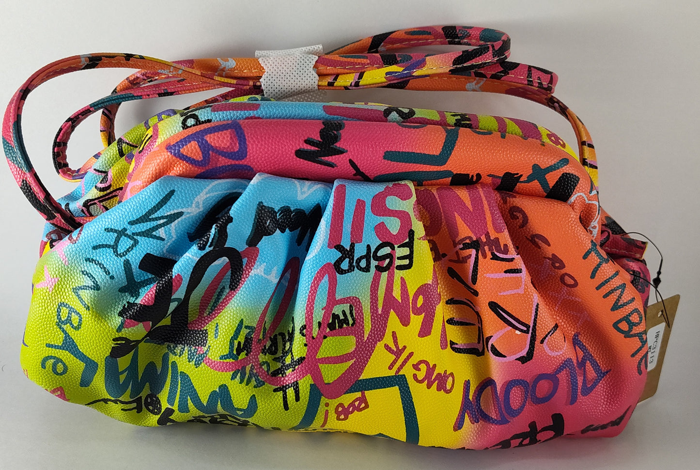 "Multicolor Graffiti Handbag – Edgy, Street Art-Inspired Statement Bag" P 114