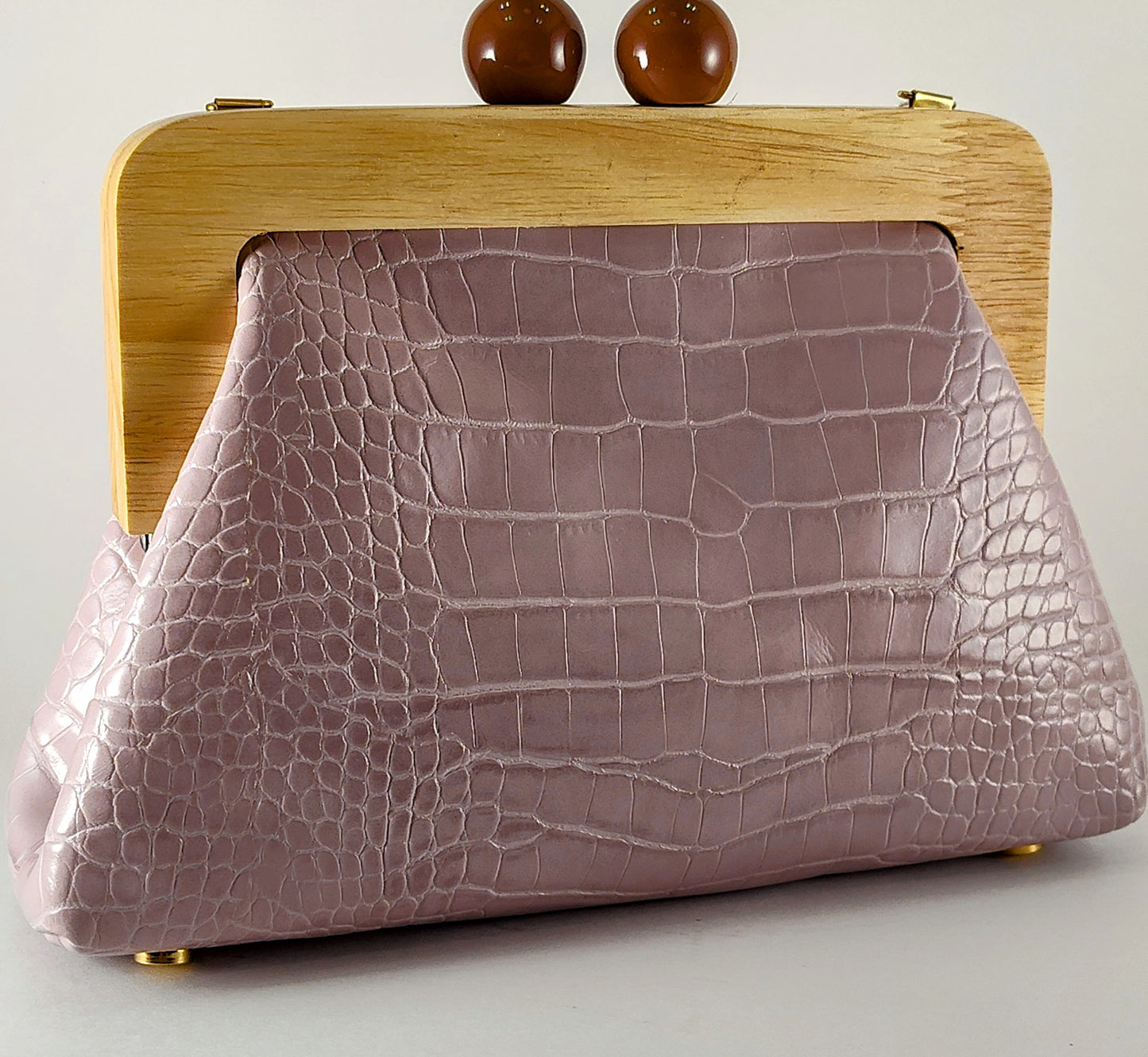 "Elegant Mauve Crocodile-Embossed Handbag with Chic Chain Strap"