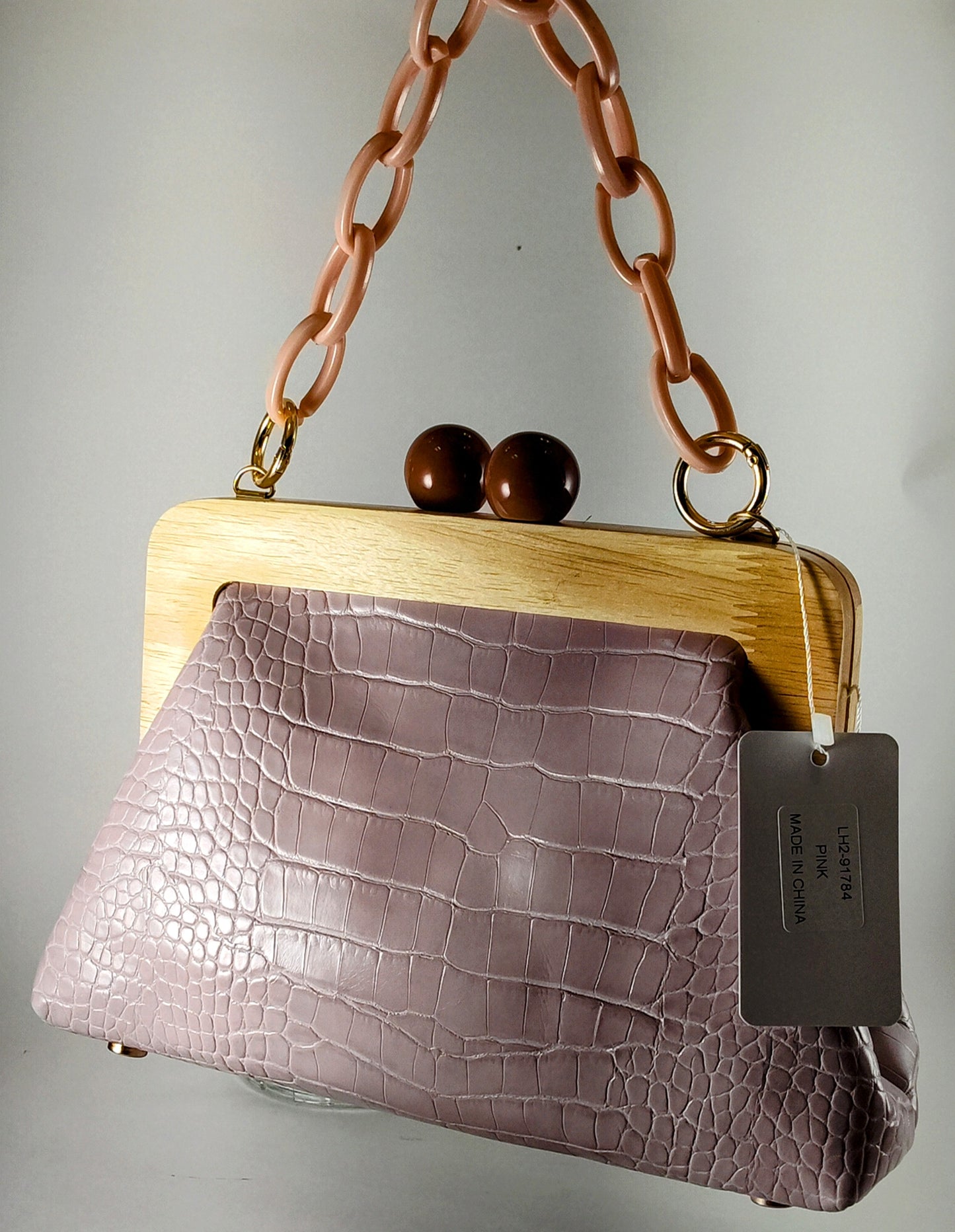 "Elegant Mauve Crocodile-Embossed Handbag with Chic Chain Strap"
