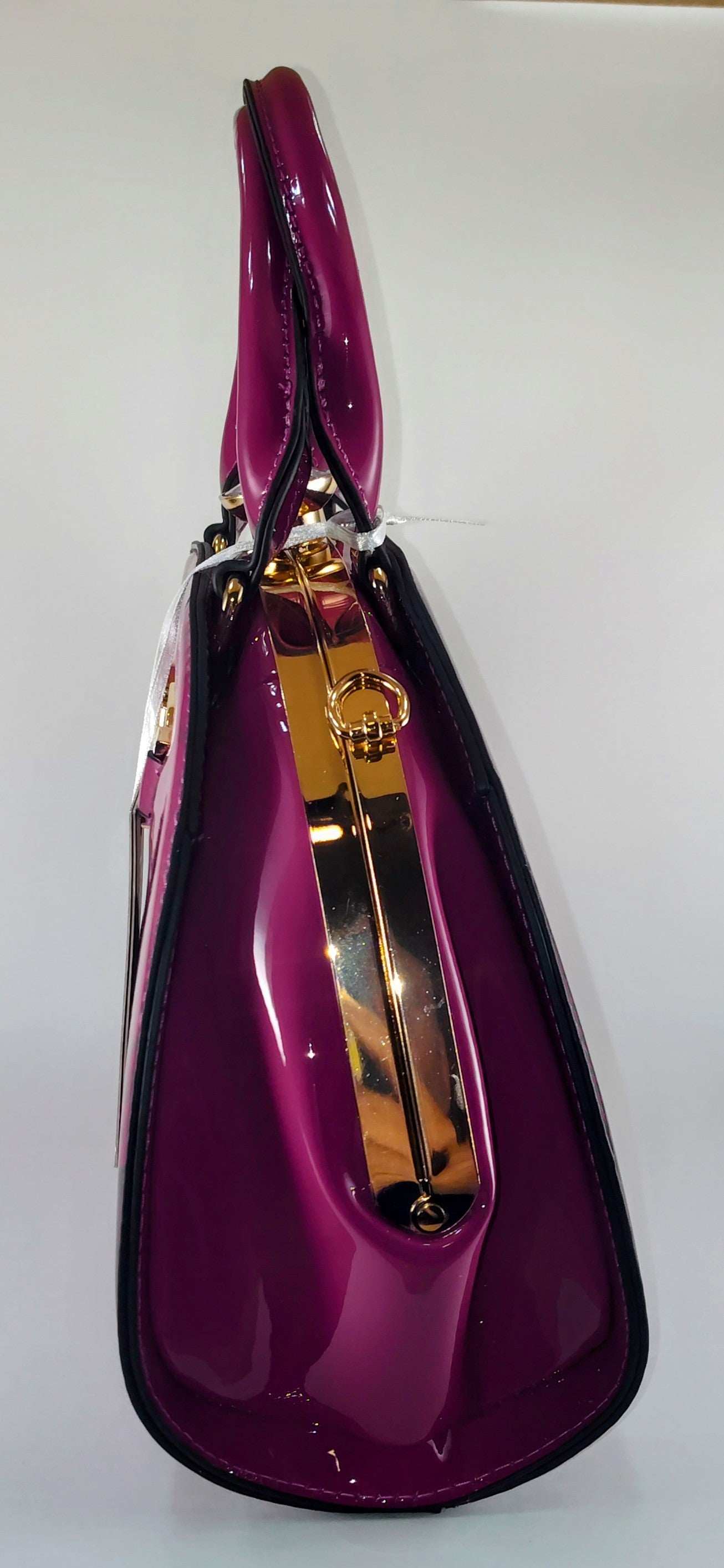 "Plum Perfection – Sleek Vegan Patent Leather Handbag for Every Occasion" P104